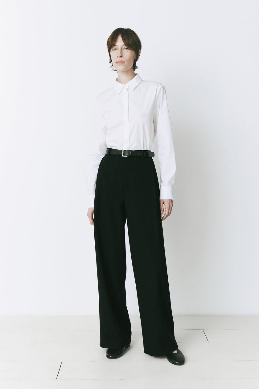 André Wide Leg Pant. Black wool blend, tailored wide-leg pants, versatile for work or evening wear.