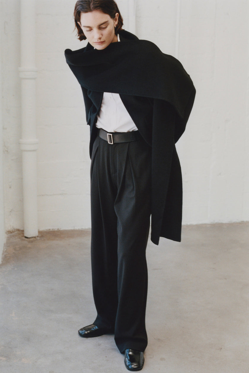 Black wool blend André Wide Leg Pant. Tailored wide-leg pant, elegant and versatile for work or evening wear.