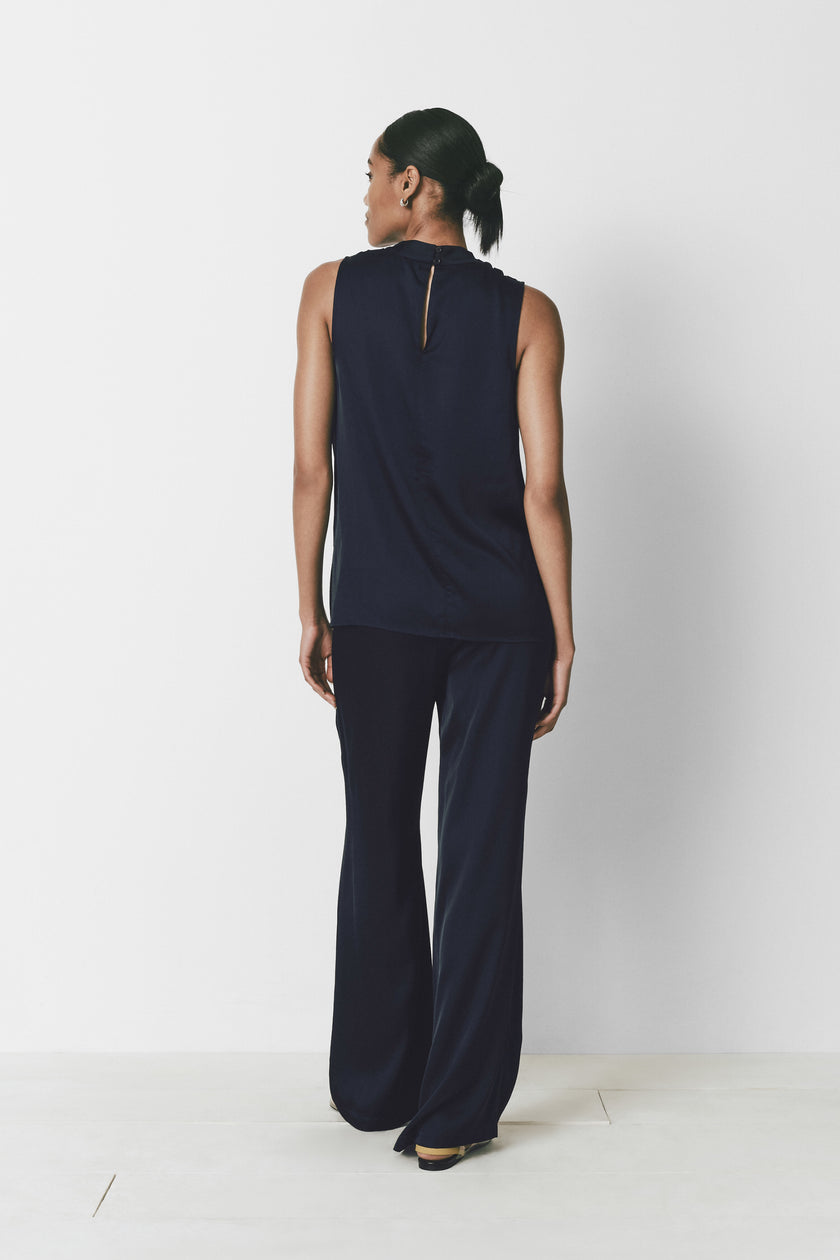 Navy Avignon Cowlneck Top with matching wide-leg pants. Soft, lustrous finish.