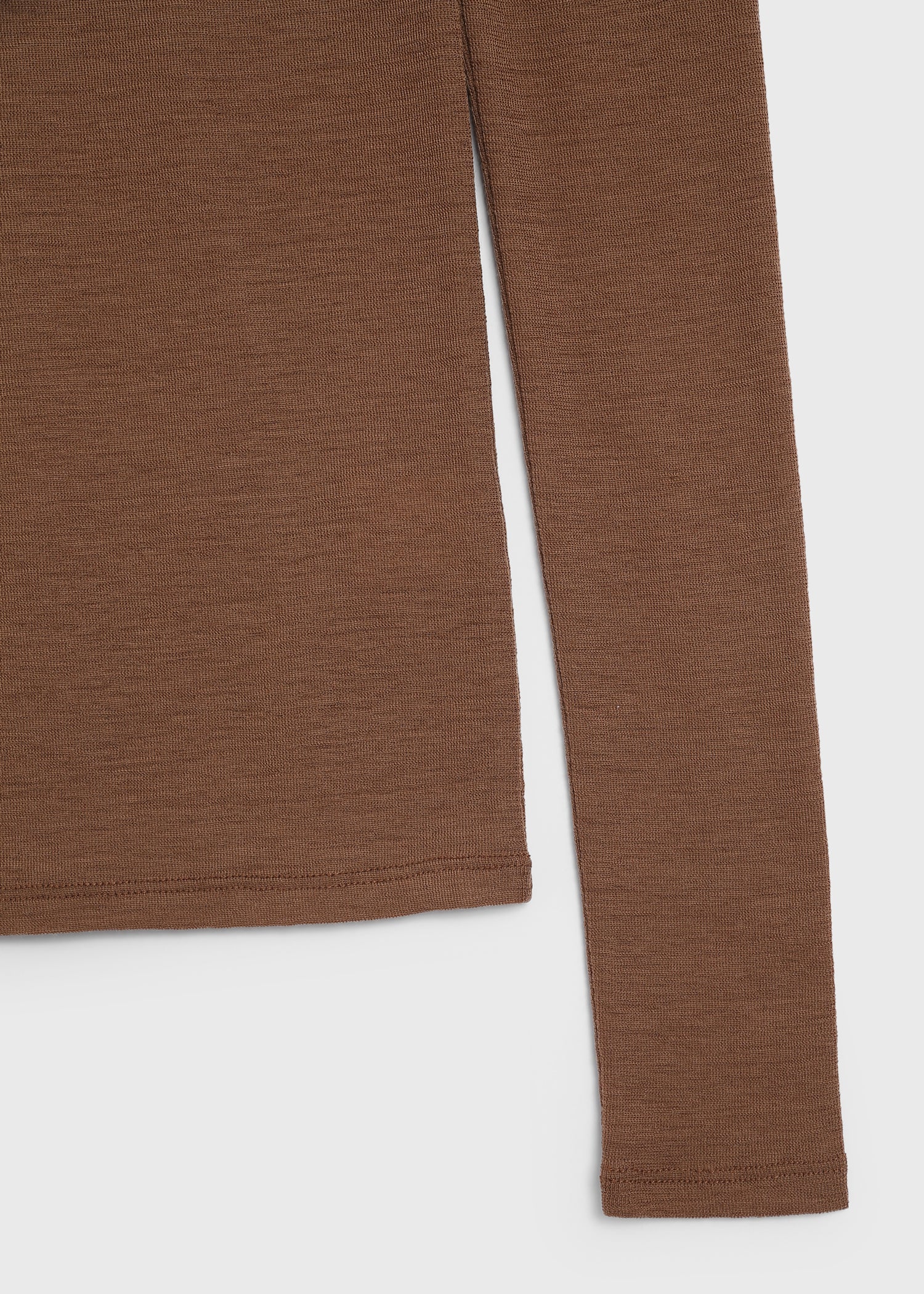 Rue Sophie Brown wool turtleneck top with long sleeves and a slim-fit design.