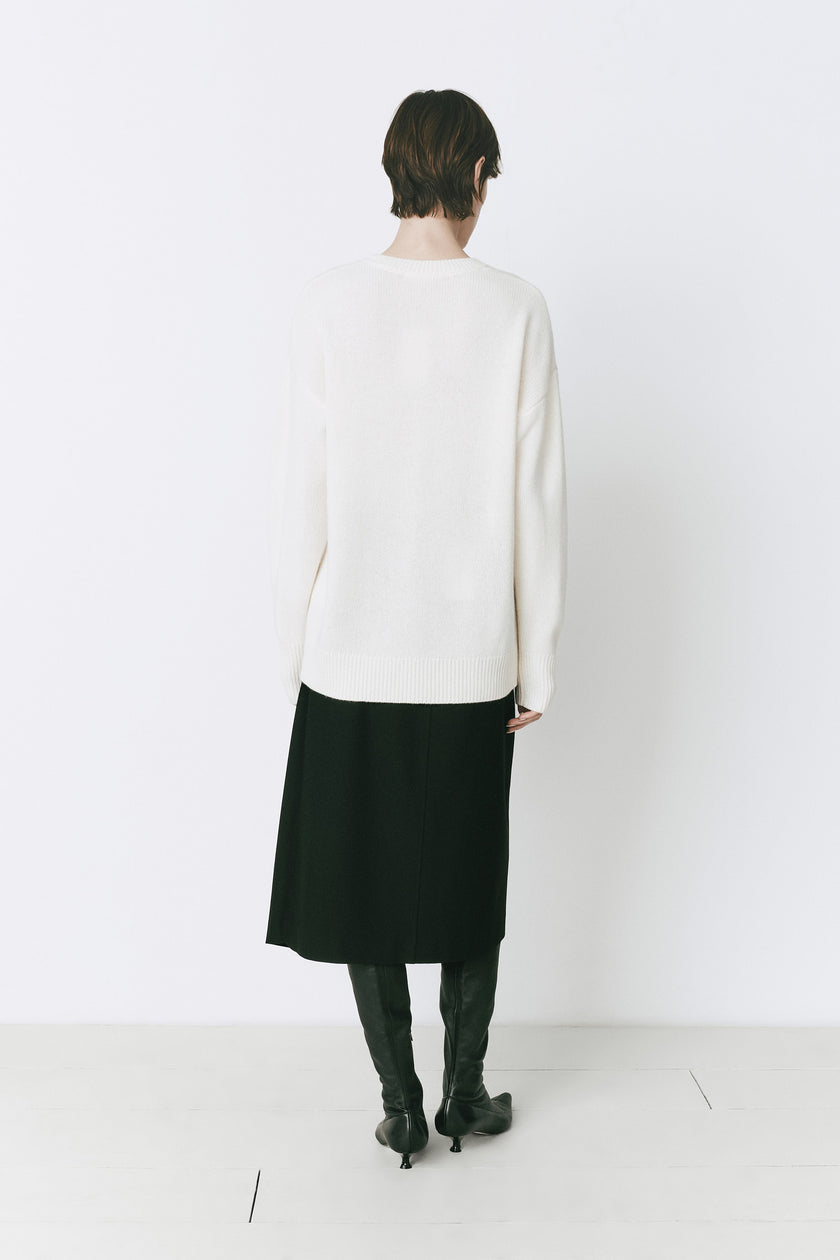 White cashmere blend sweater for women, loose fit for layering, black skirt and knee high boots