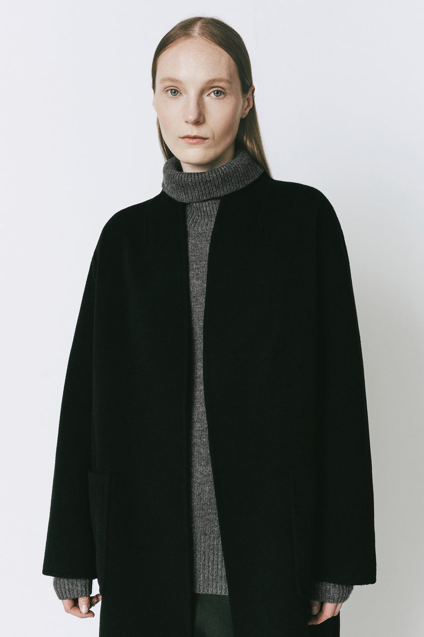Black wool-cashmere Châtillon Belted Coat on a woman, oversized fit, for fall layering