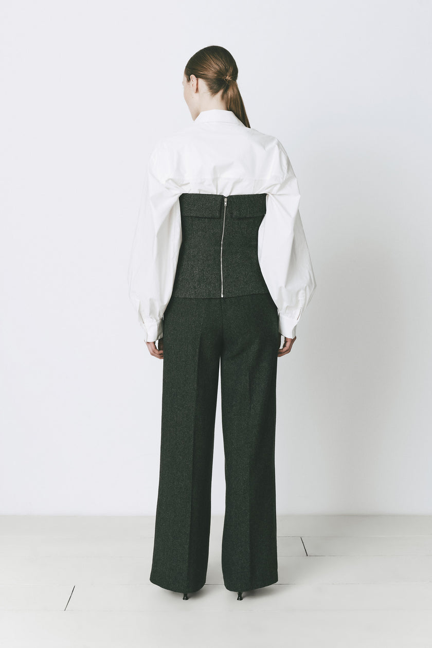 Concorde Bustier Top ensemble: Dark green wool blend trousers with a cinder herringbone bustier and white shirt.