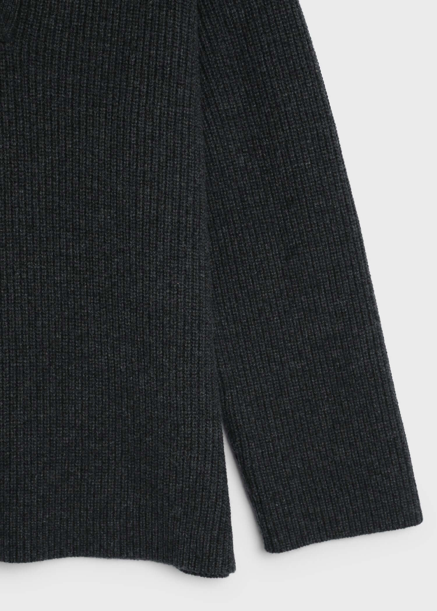 wool-blend oversized V-neck sweater in dark charcoal. 