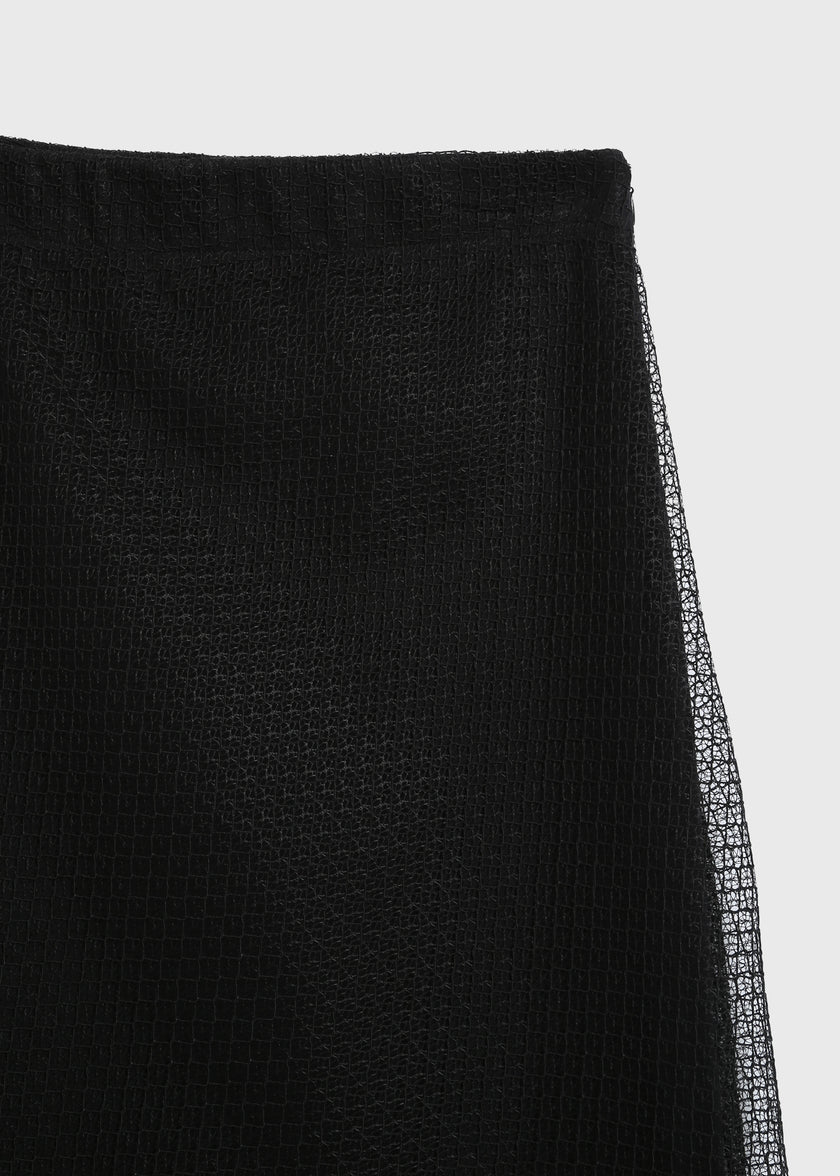 Black mesh maxi skirt, elegant and flowy, featuring sheer detailing, perfect for fall/evening wear.