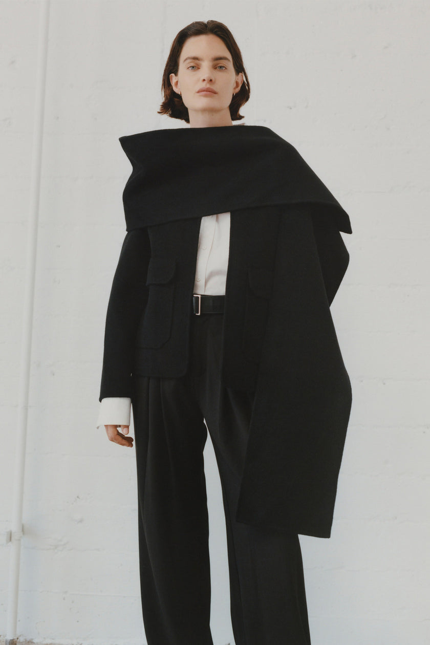 Rue Sophie Jardin black wool coat with scarf detail, modern woman's fashion