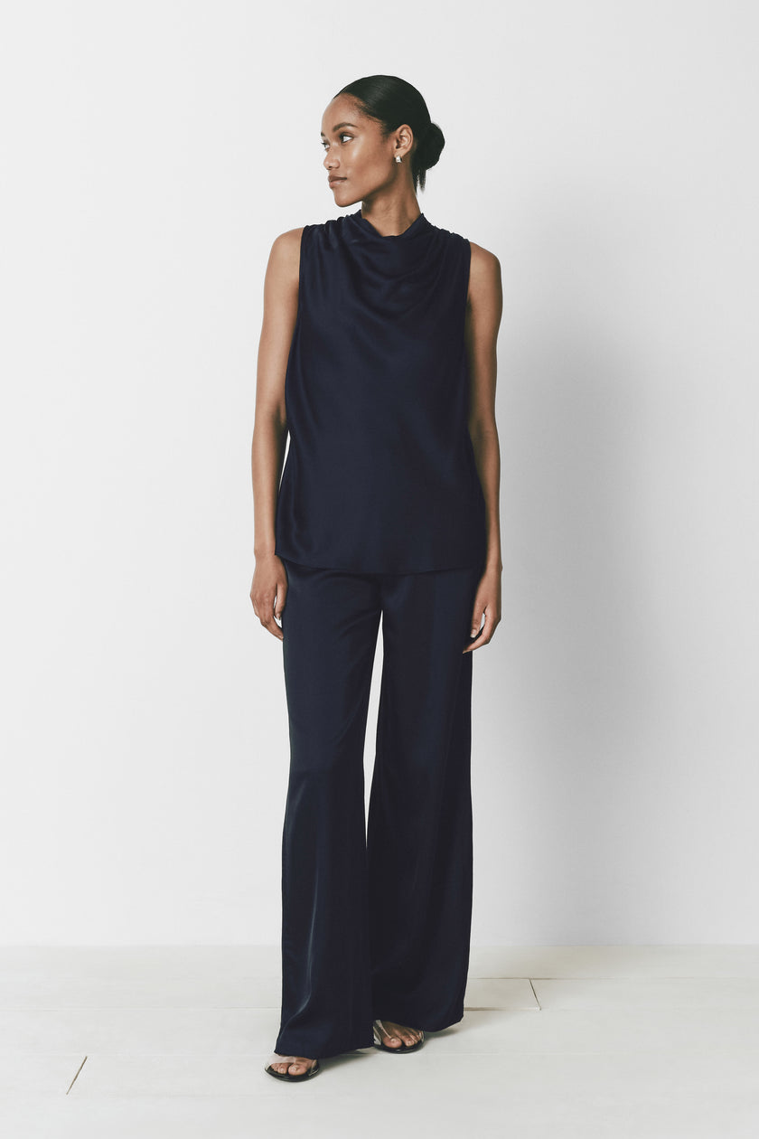 Navy Le Sud Pant Set. Wide-leg pants and satin top from Rue Sophie. Modern style.