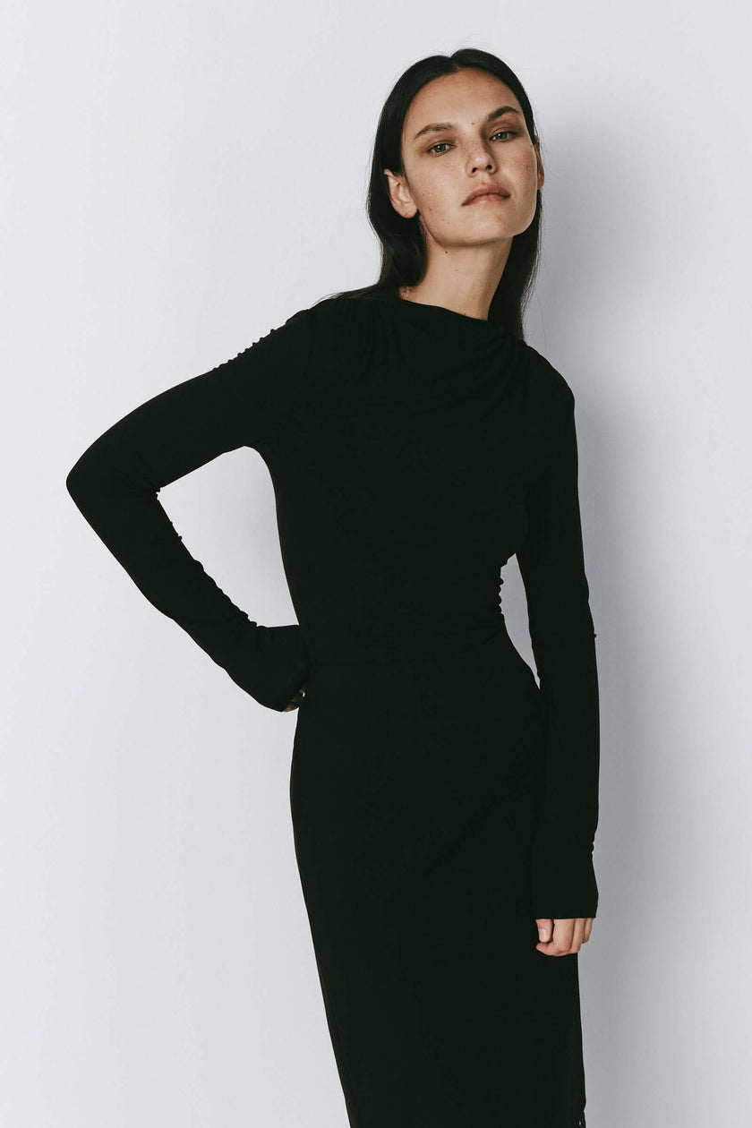 Black Liane Modal Knit Top on model, long sleeve, mock neck, elegant and flattering fit