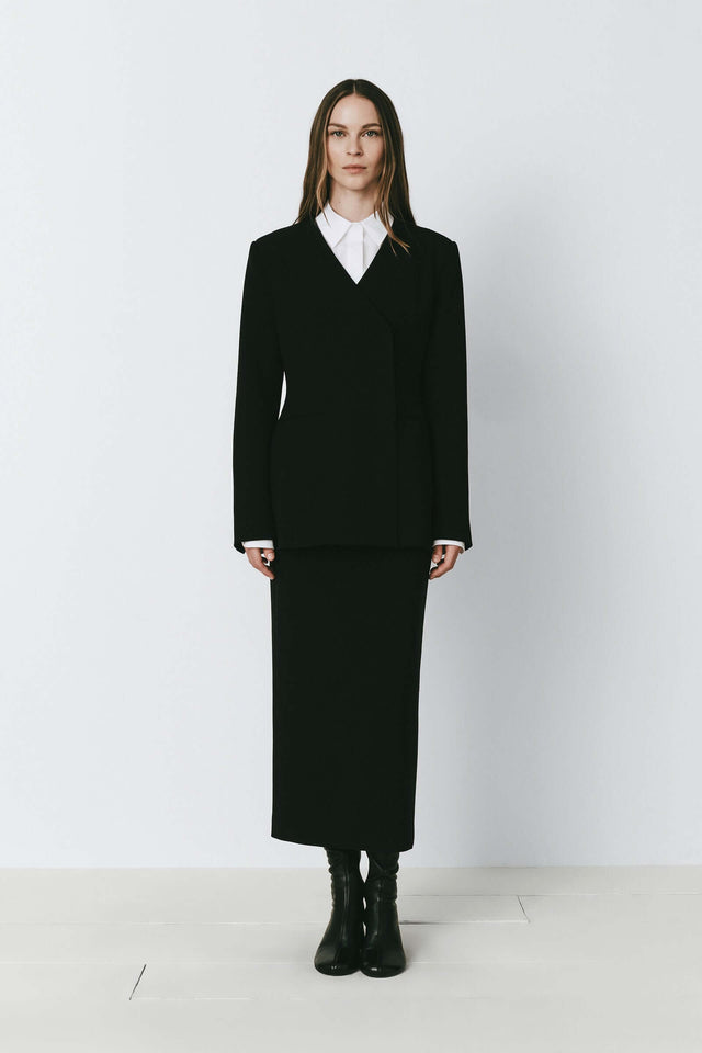 Black Marion Side Slit Jacket and Skirt Set. Versatile for day to night. Polyester-rayon blend.