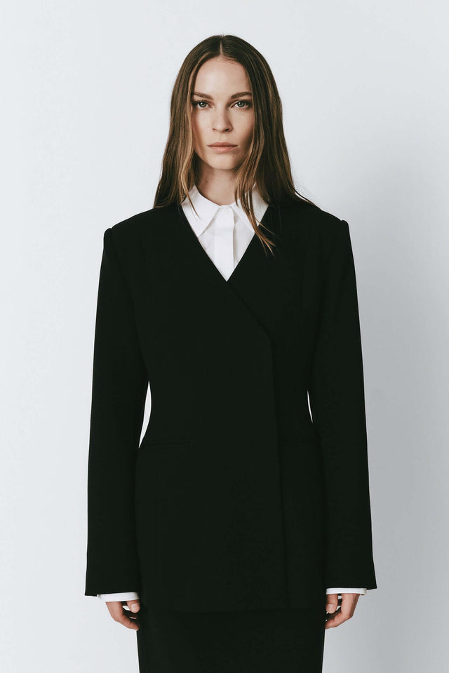 Black Marion Side Slit Jacket on a woman, Polyester-rayon blend blazer, day-to-night wear.
