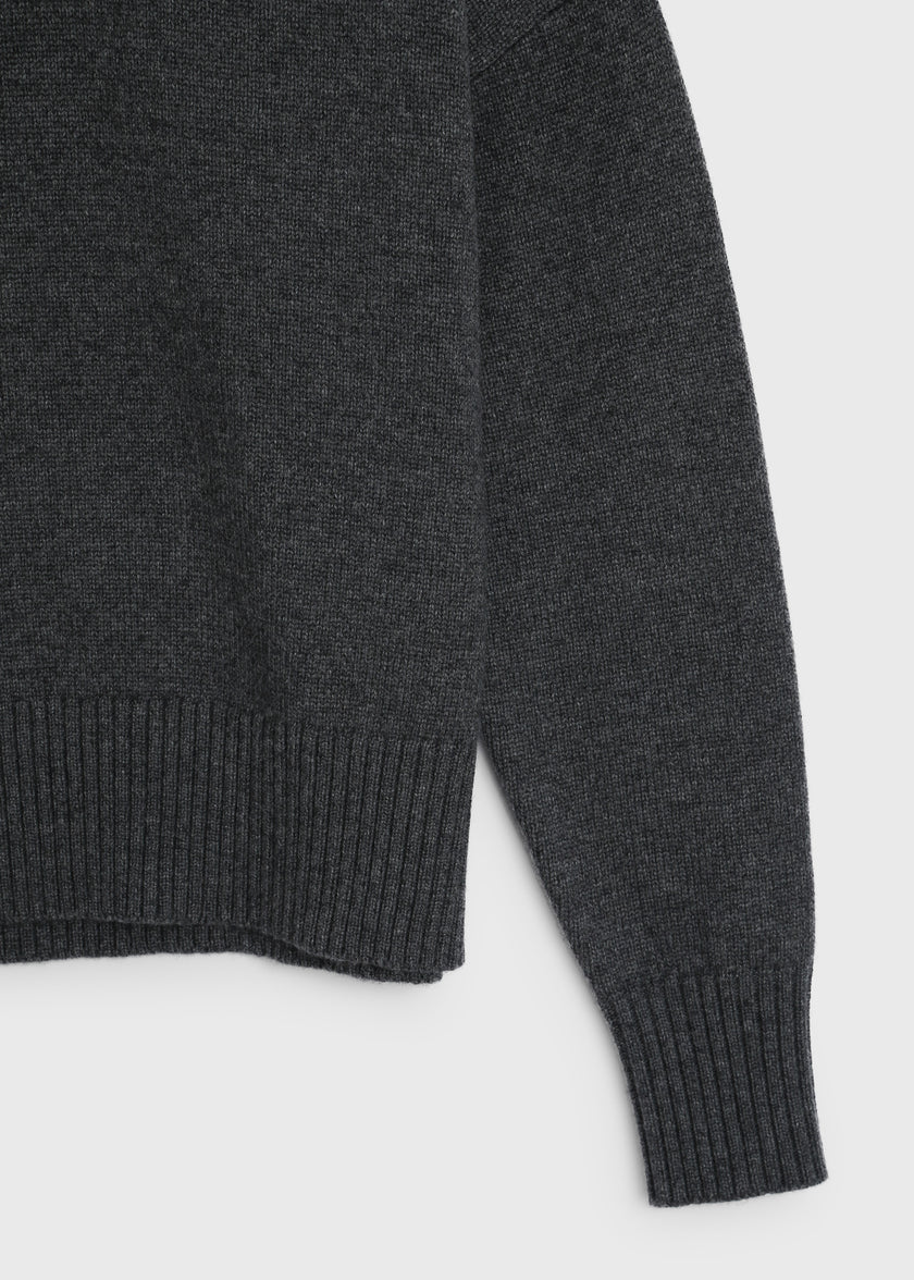 Ruesophie Marne Boxy Turtleneck Sweater in dark grey wool-cashmere blend, showcasing ribbed cuff detail.