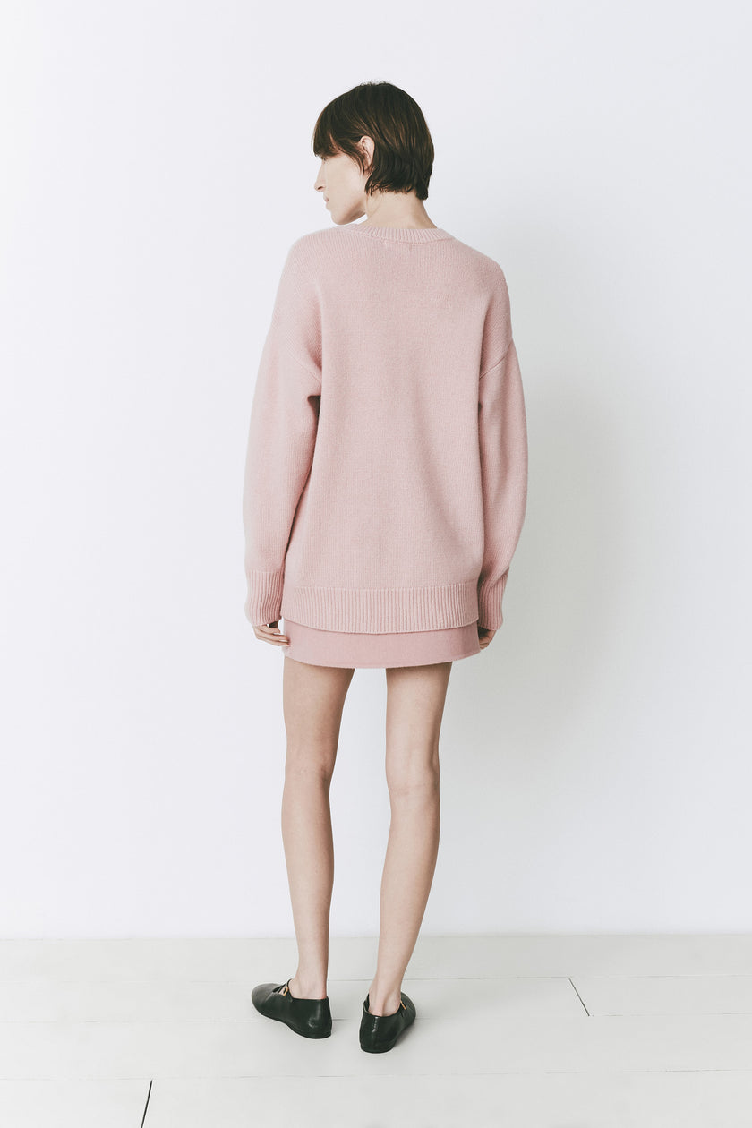 Rose wool blend sweater and Mirabeau Mini Skirt, perfect for layering. Rue Sophie's fall collection