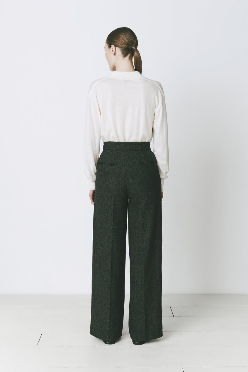 Woman in Neige Collared Sweater and dark green trousers. Lightweight, loose fit, soft. Rue Sophie style.