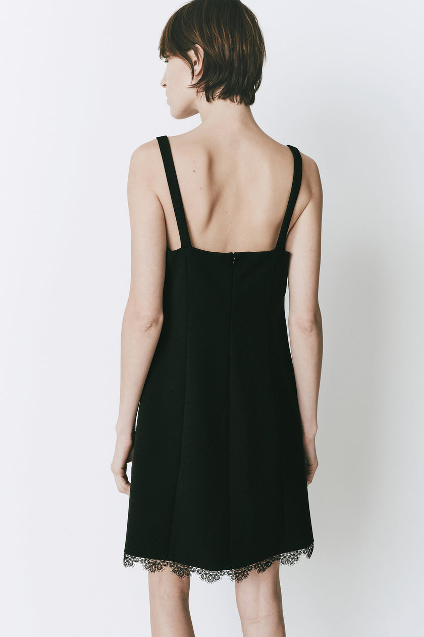 Black Rêve Lace Trimmed Mini Dress back view, featuring lace trim and square neckline, perfect for any occasion