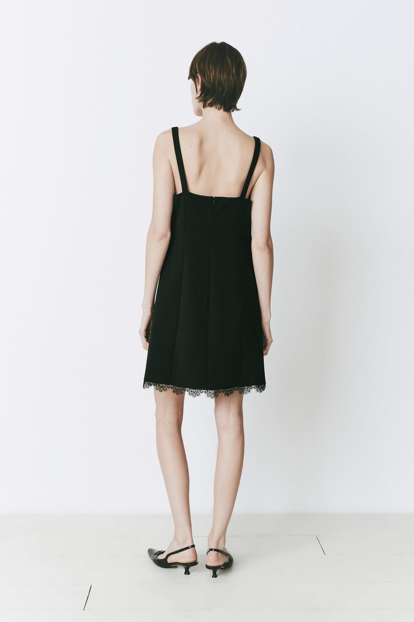 Black Rêve Lace Trimmed Mini Dress with lace trim, back view
