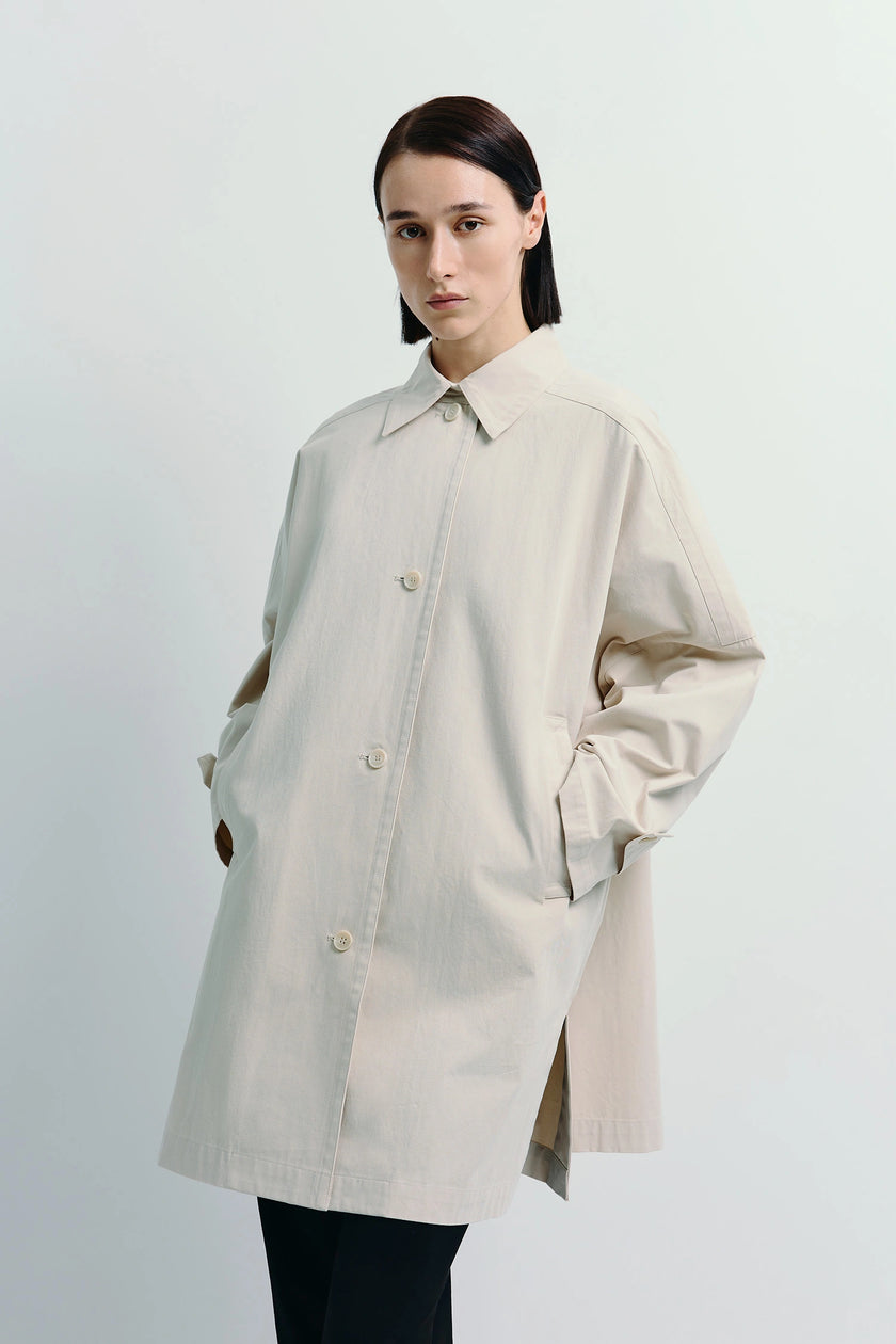 Provenance Oversized Jacket, light beige midi coat with button front, side slit. Relaxed, effortless layering.