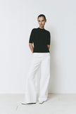 Chabot Mock Neck Top, black quarter sleeve top with white wide-leg pants, relaxed fit, Rue Sophie