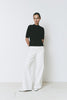 Chabot Mock Neck Top, black quarter sleeve top with white wide-leg pants, relaxed fit, Rue Sophie