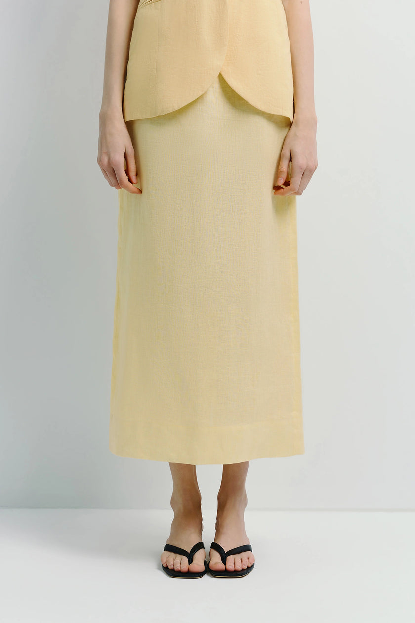 Lemon yellow linen midi skirt set for women, featuring a textured finish, perfect for a minimalist style.