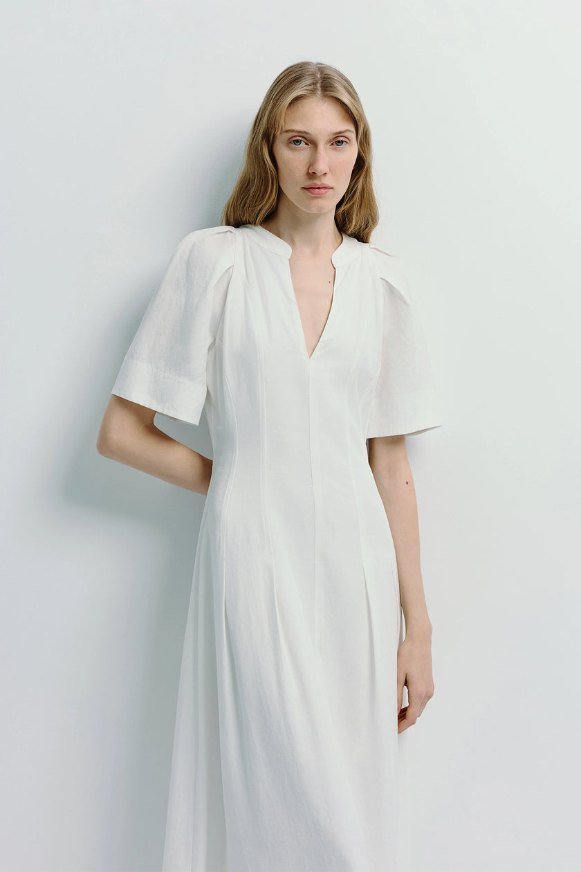 Carlyl Pleated Sleeve Dress in white, crafted from a lyocell-linen blend, featuring softly pleated sleeves.