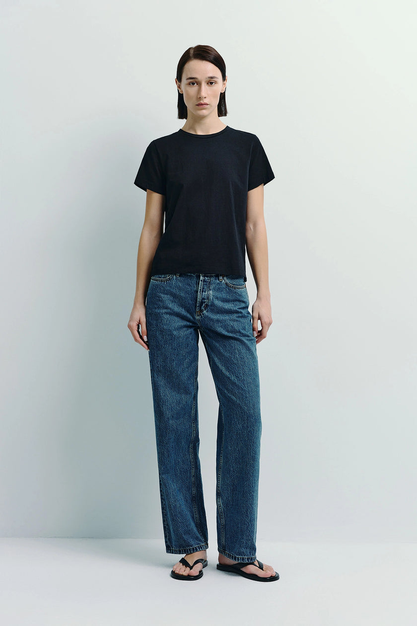 Fay Crew Neck Tee in black paired with blue denim jeans, minimalist style, sustainable cotton