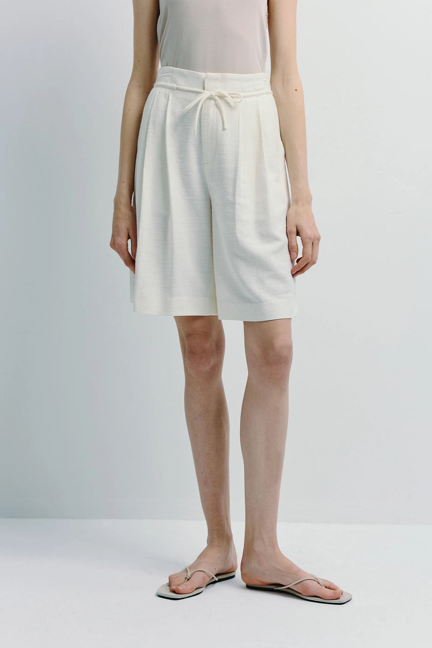 White linen blend Arc Tie Waist Short, tailored fit, perfect for warm weather, featuring adjustable tie waist.