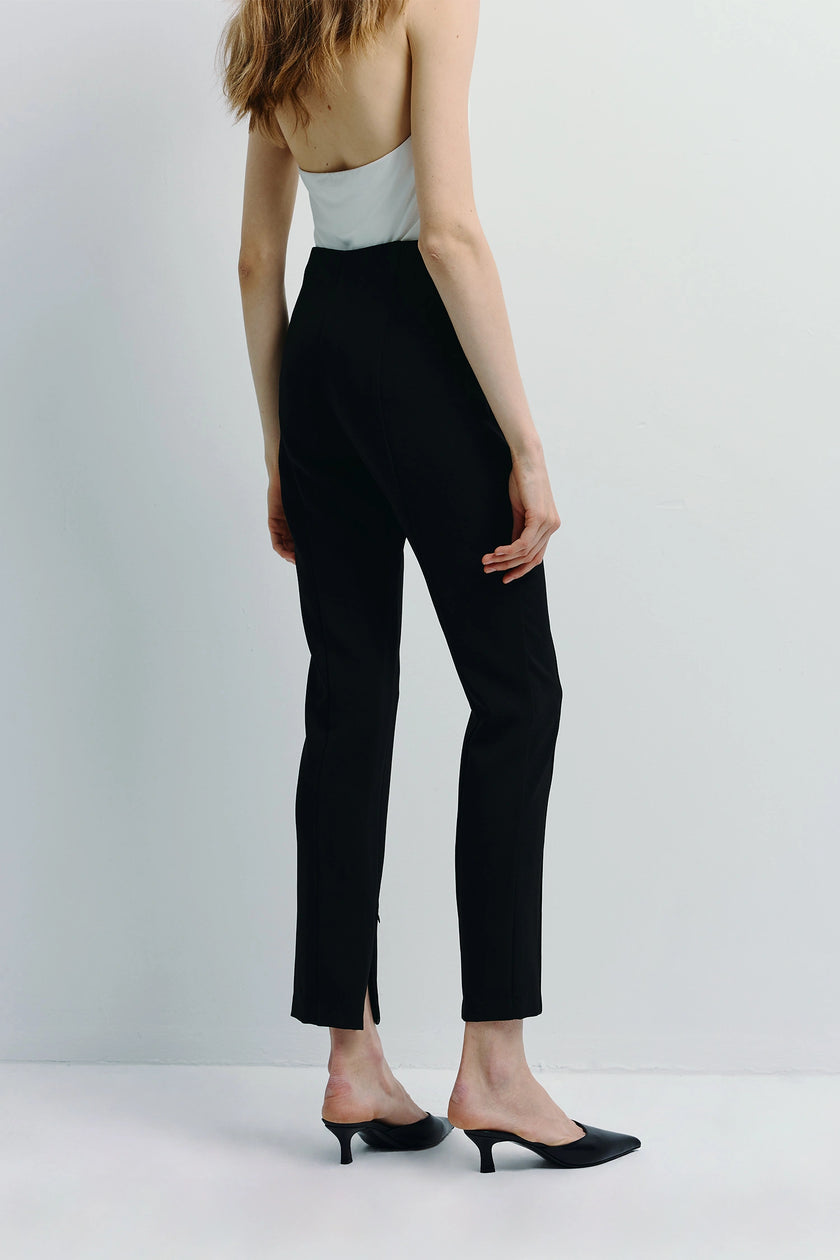 Reims Zip Hem Slim Pant in black, slim-fit with zip detail; elegant modern style