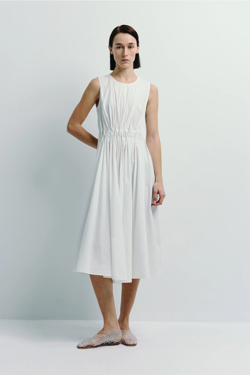 White Toulouse Origami Pleat Dress. Sleeveless midi dress with pleated bodice and fit-and-flare skirt.