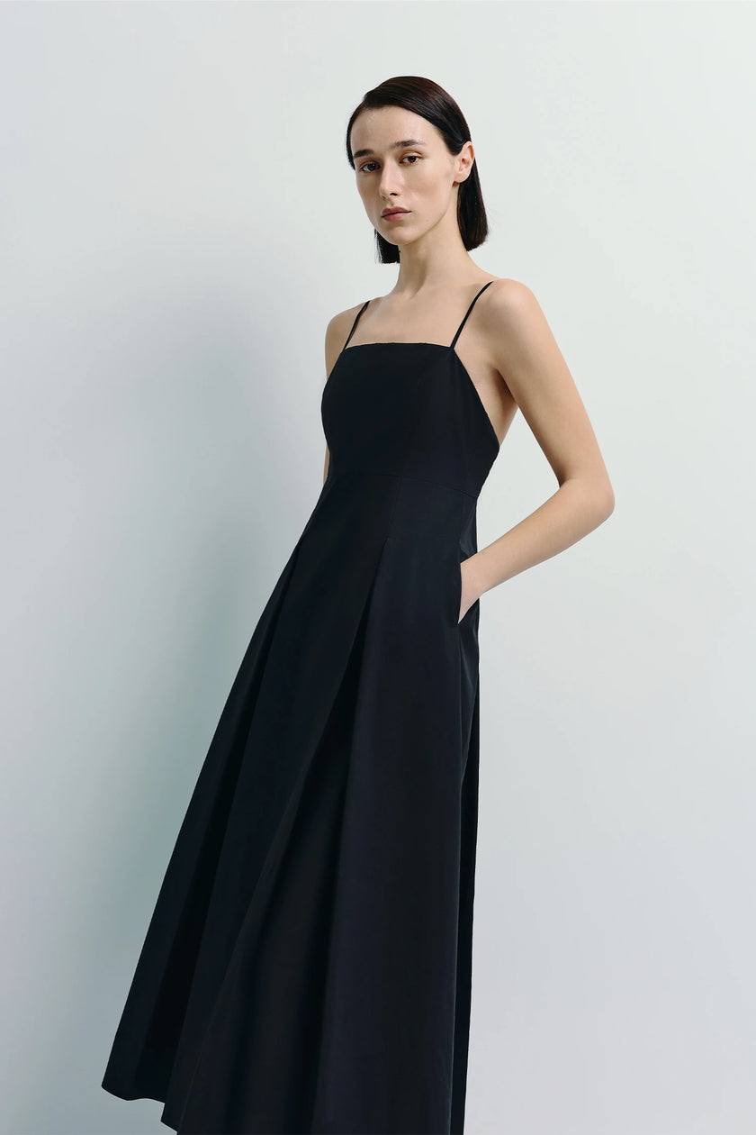 Black Nantes Cami Dress, featuring pleat front detail, fluid silhouette, and crafted from 100% cotton