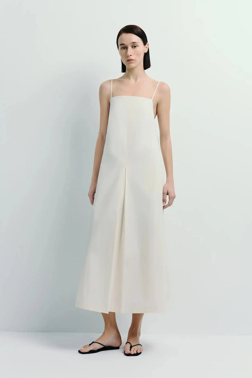 White cotton cami dress with box pleats, square neckline, feminine silhouette, perfect for daily commute