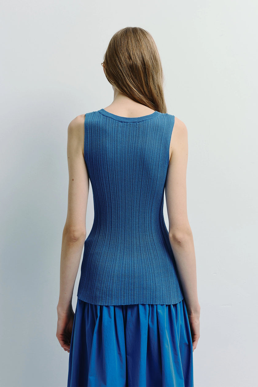 Monique Ribbed Knit Top in blue, a sleeveless ribbed knit top and blue skirt. Viscose-nylon.