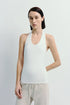 Chaleur Halter Top in white, soft modal blend. Minimalist design, sculpted fit, perfect for a refined look.