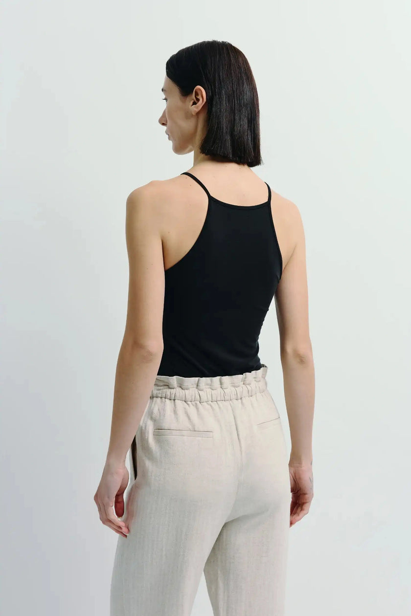 Lola Halter Cami Top in black, minimalist design, paired with neutral linen pants, Rue Sophie