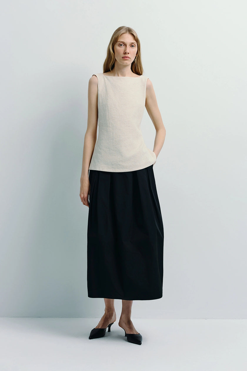 Carré High Square Neck Top and Black Skirt. Cream linen-blend top, modern minimalist fashion.