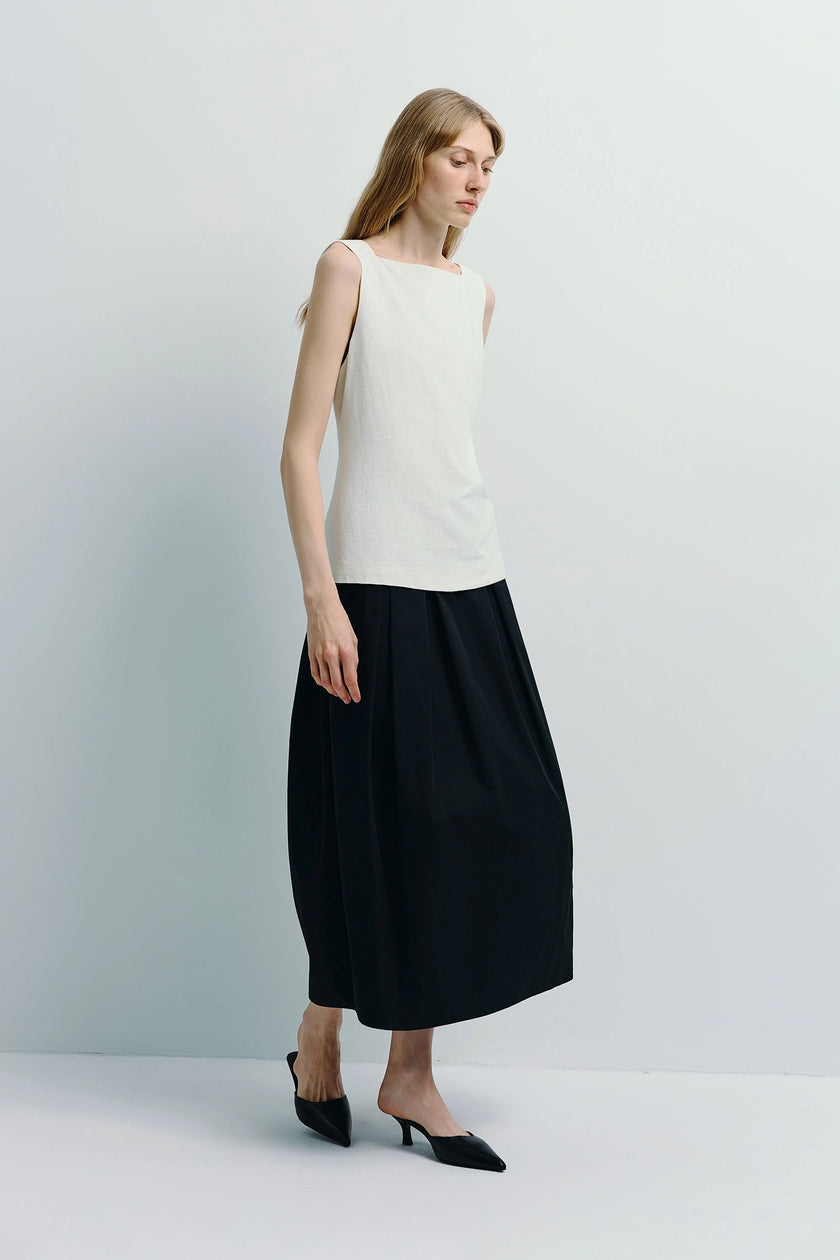 Carré High Square Neck Top in white linen-cotton blend, paired with a black skirt