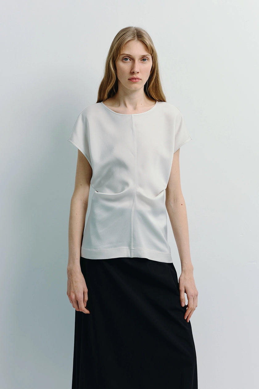 Ivory Bureau Dolman Top and black skirt. Featuring dolman sleeves and structured silhouette.