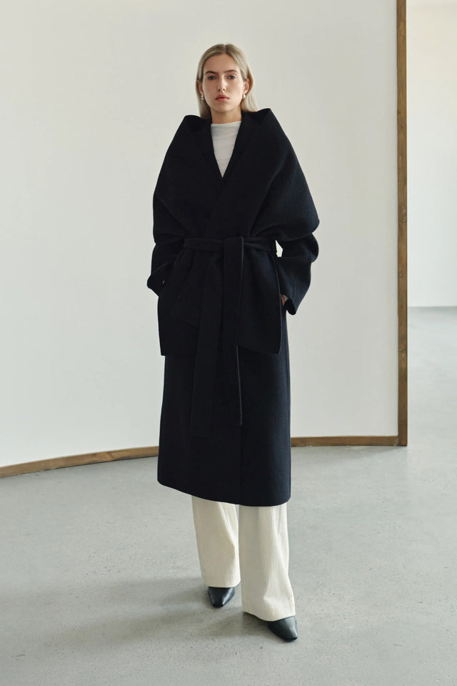 Rue Sophie Grand Scarf Handmade Coat in Black, front view with oversized scarf collar, self-tie belt and longline silhouette.
