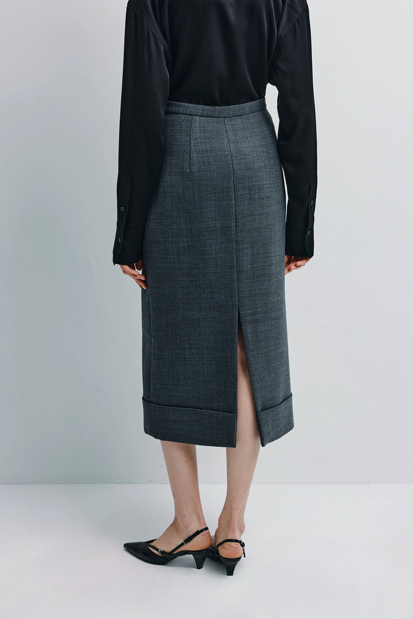 Ruesophie Paley midi skirt in gray wool blend with back slit, black blouse, and heels for women
