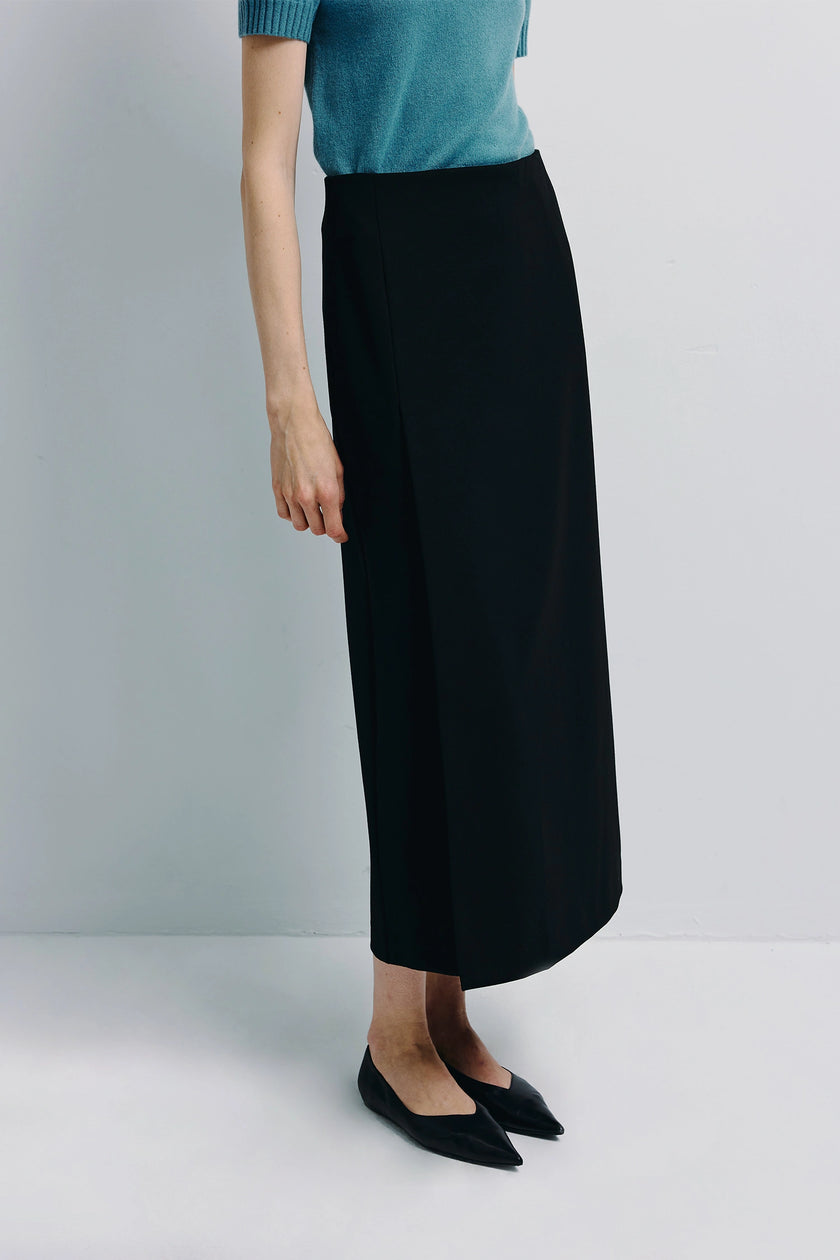 Bex Open Side Midi Skirt in black with side slit, paired with teal top and black flats