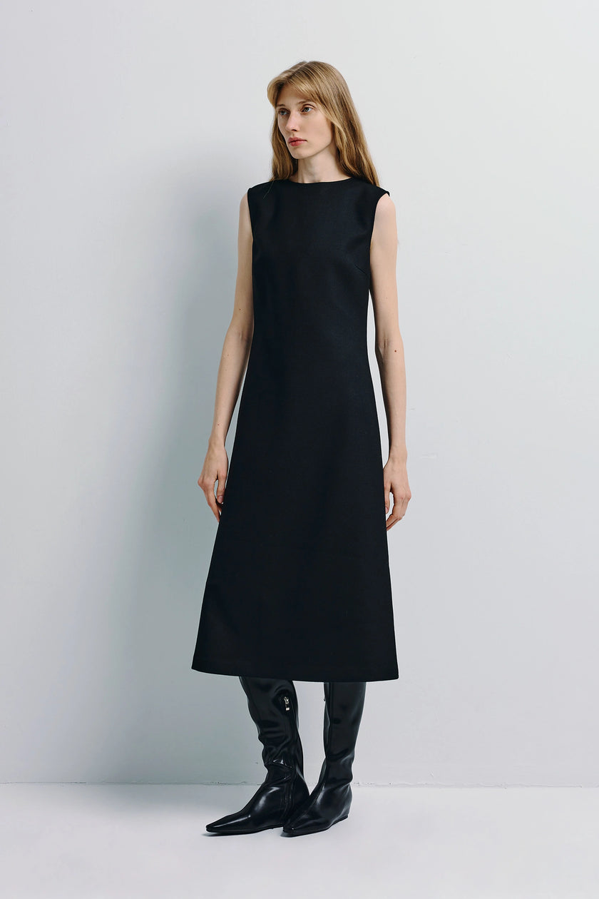 Black Roze A-line Midi Dress, featuring boatneck, A-line silhouette, paired with black boots