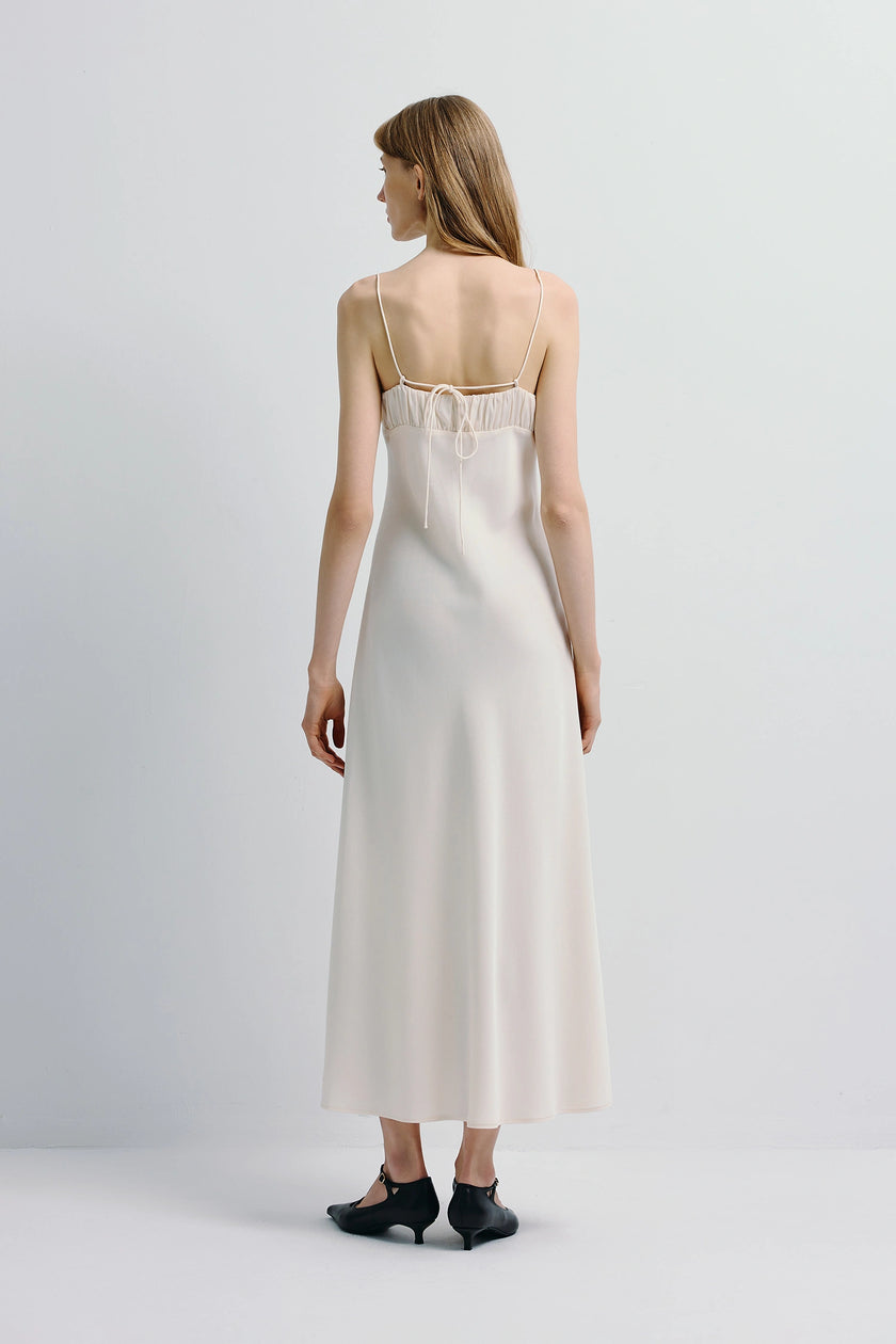 Ivory satin midi dress back view with spaghetti straps from Rue Sophie