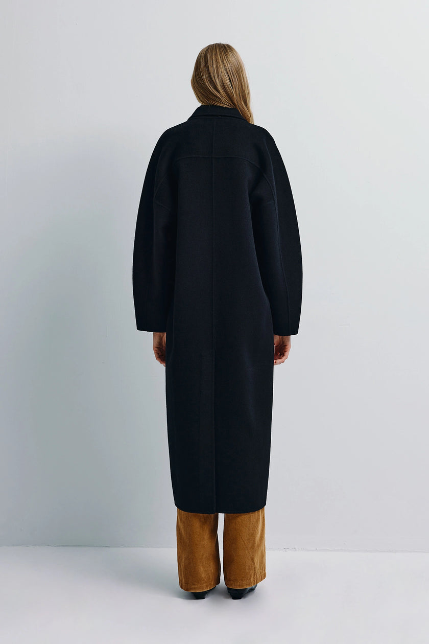 Basile Handmade Black Coat, rear view. Wool-cashmere blend, sharp lines.