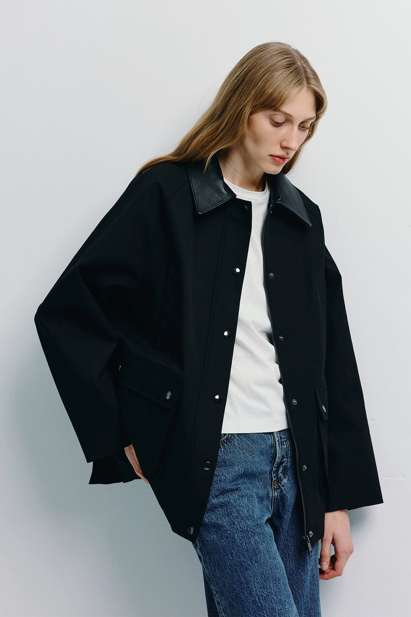 Black Roth Leather Barn Jacket with leather collar, worn by a woman, with jeans