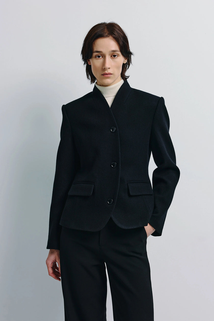 Camberly Collarless Short Blazer in black, wool-cashmere-silk blend, modern tailoring, paired with black trousers
