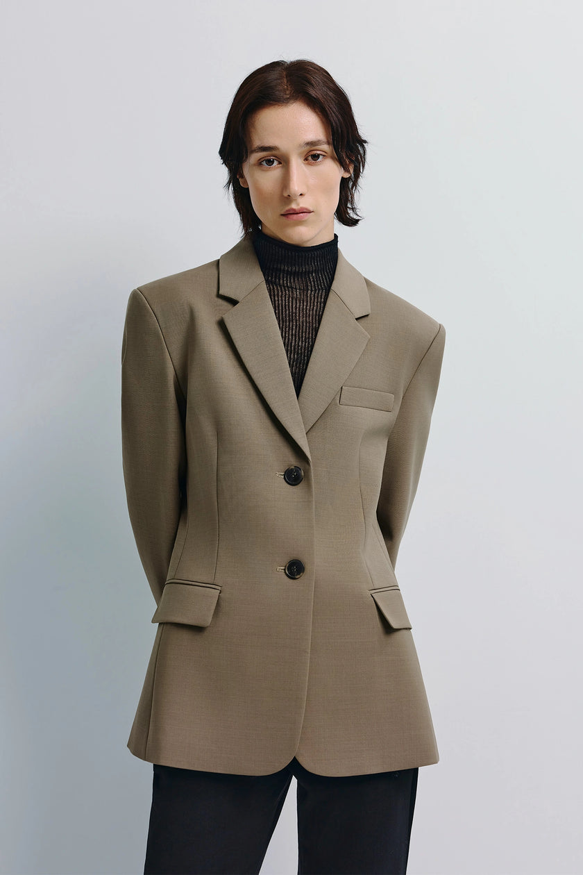 Rue Sophie Ellison Oversized Blazer in beige, featuring structured shoulders and tailored cut