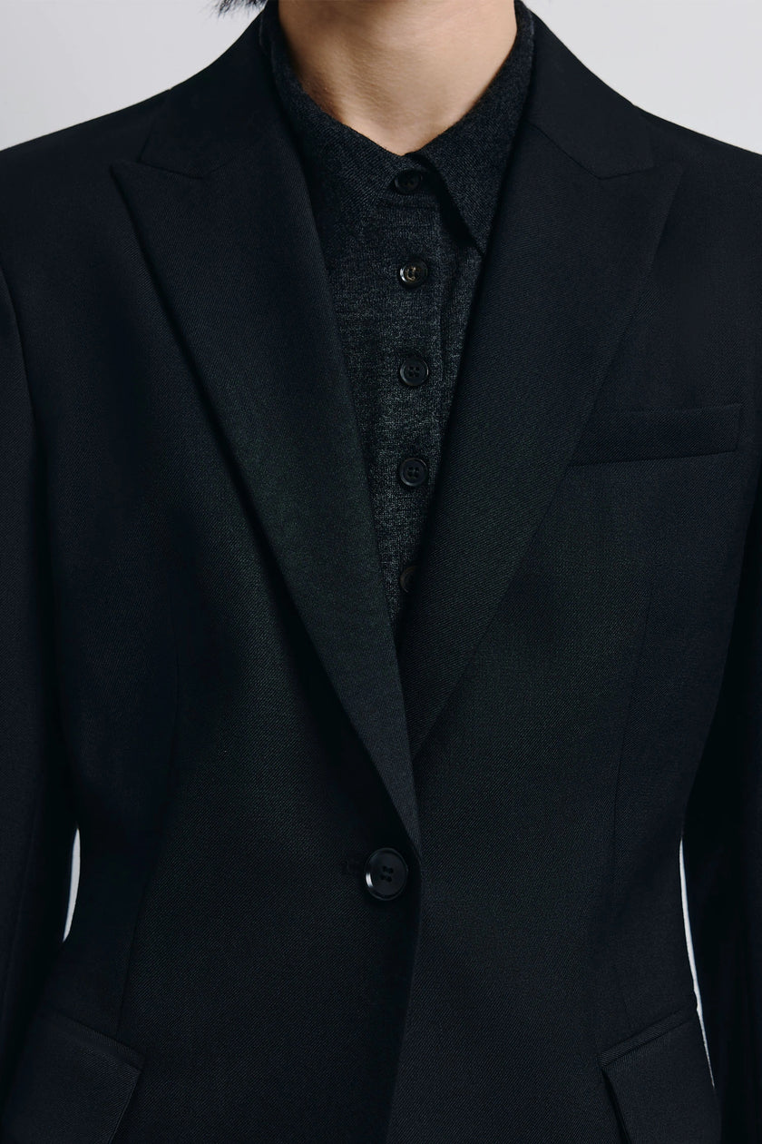 Black Jin Slim Waist Wool Blazer with single-button closure, tailored fit and wool blend material.