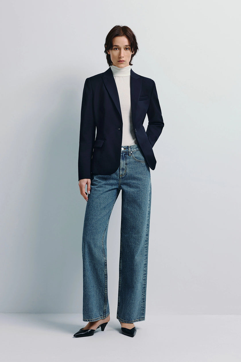Navy Jin Slim Waist Wool Blazer with white turtleneck and blue jeans, single-button closure