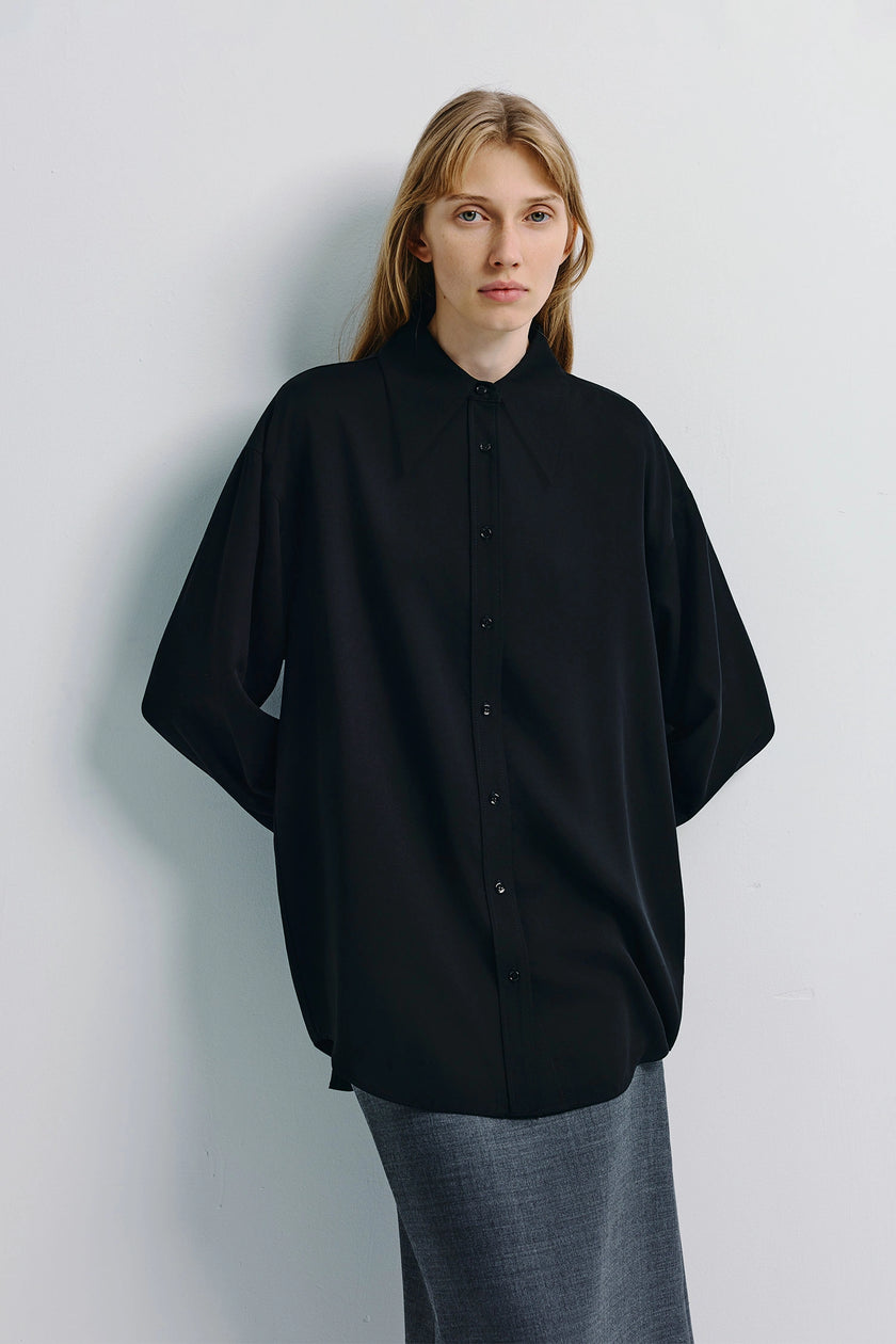 Rue Sophie Darrion Pointy Collared Shirt in black. Long sleeve shirt with sharp collar.