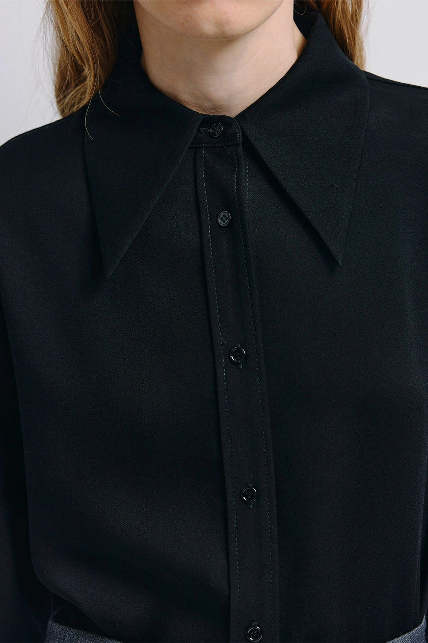 Rue Sophie Darrion Pointy Collared Shirt in Black, with a fluid lyocell blend and button front