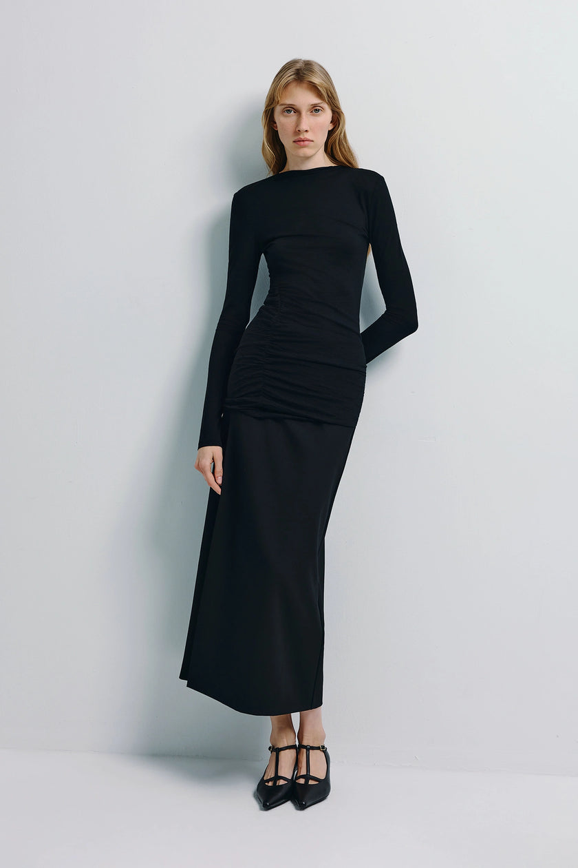 Wren Fine Knit Boatneck Top and matching black skirt, featuring side ruching and sleek silhouette.